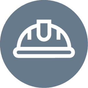 There is an icon of a white hard hat in a gray circle.